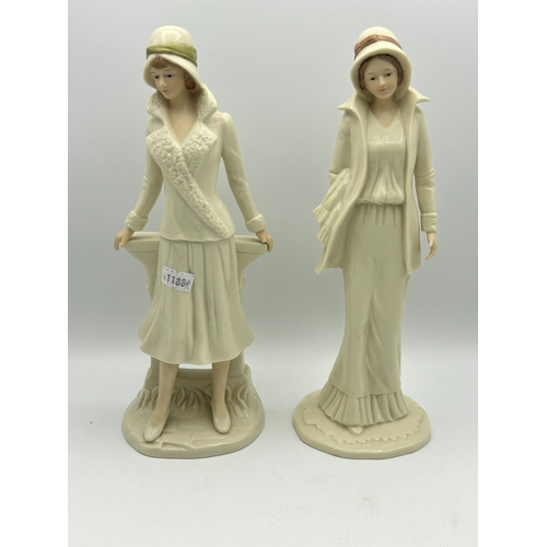 32 - Two Regal Figures Standing 10”