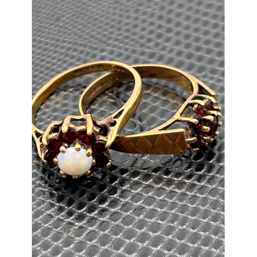 76 - A Pair Of 9ct Rings With Garnet, One With Opal, Stones Missing. 3.5g