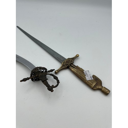 142 - Two Brass Letter Openers In The Style Of A Sword.