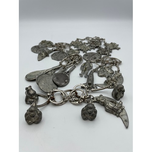 168 - Variety Of Various White Metal Keyrings.