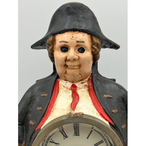 416 - Cast Iron German Novelty Clock , Ticking Eyes, With Key And Running, Stands 10