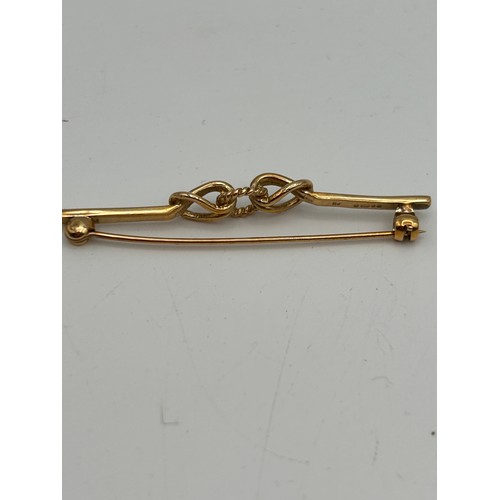 94 - 9ct Knotted Brooch 3.3g