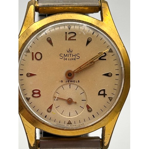 184 - Vintage Gents Manual Wind Smiths De-Luxe Wrist Watch In Running Order.