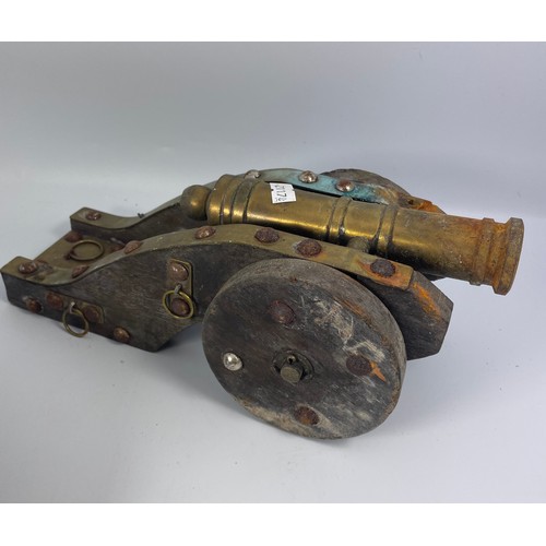 343 - Two Wood And Brass Decorative Cannons 13” x 5”.