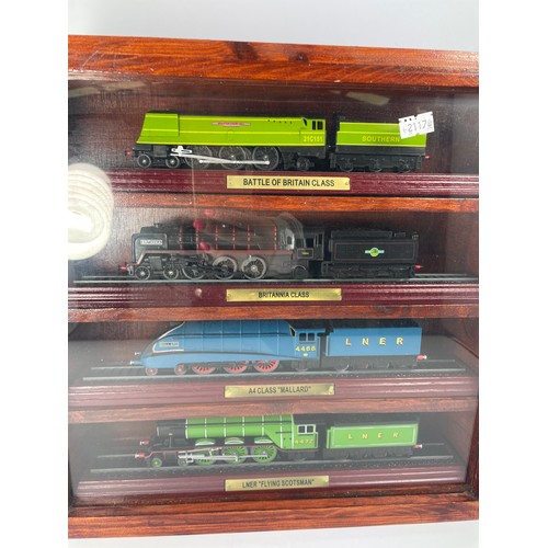 348 - Cased Display Of Diecast Model Trains 12” x 14”.