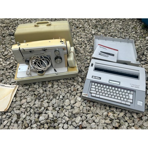 379 - Vintage Crown Point Sewing Machine and Smith Corona Typewriter