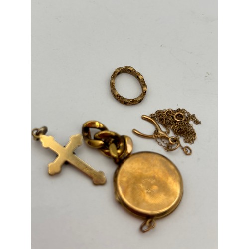 562 - Little Bag OF Yellow Metal Items , Including Lovely Little Crucifix. 8.5g