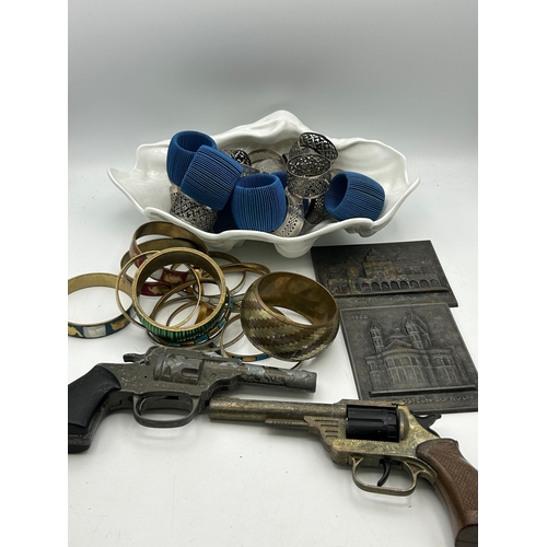 10 - Mixed Lot To Include Napkin Rings, Bangles, Plaques and Toy Pistols