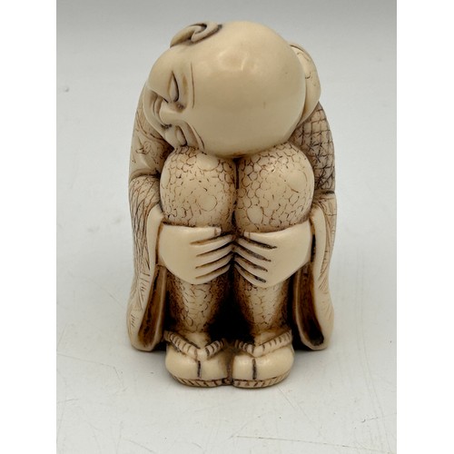 69 - Small Resin Carved Figure Of Sleeping Buddha , Standing 2.5