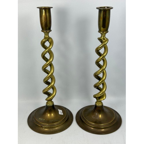 144 - Pair Of Brass Candle Holders Standing 12”.