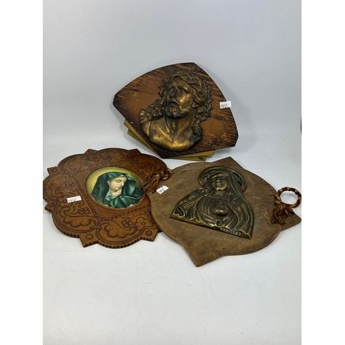 150 - Three Religious Plaques , Wood And Brass Largest 10” x 10”.