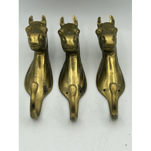 151 - Set Of Three Brass Horse Coat Hooks 6” x 2”.