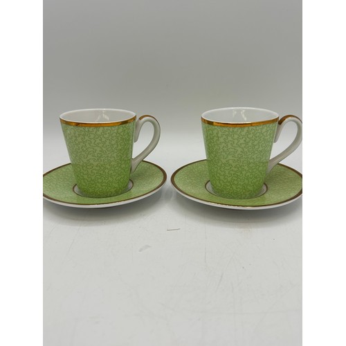 450 - Royal Worcester Pair Of Coffee Cups In Celebration Of HRH 80th Birthday.