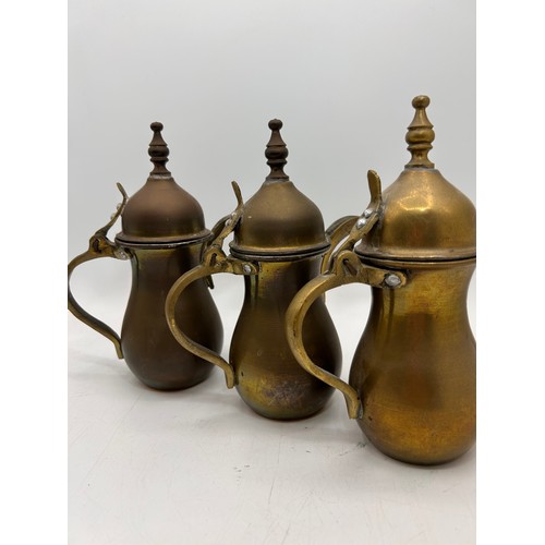 226 - Three Middle Easter Brass/Copper Coffee Pots , Standing 7.5