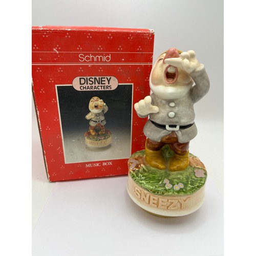 73 - Musical Ceramic “Sneezy” Dwarf. Stands @ 7”