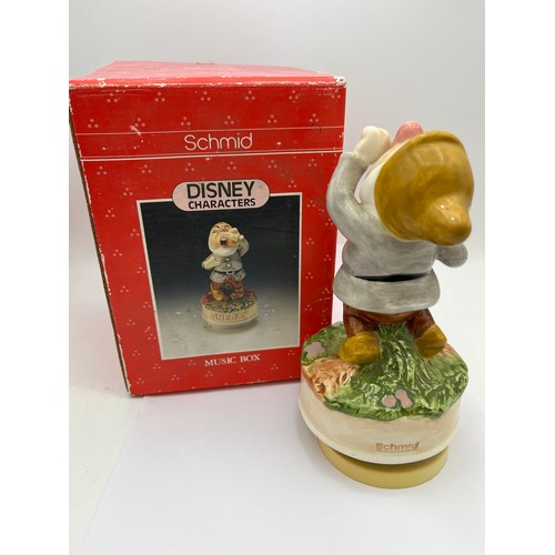 73 - Musical Ceramic “Sneezy” Dwarf. Stands @ 7”