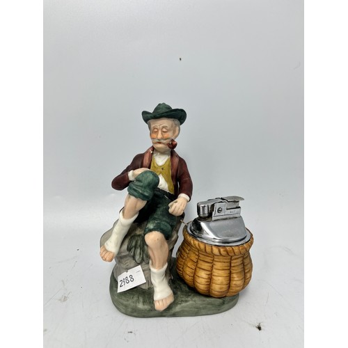 35 - Ceramic Figurine With Decorative Lighter. Standing 5.5”