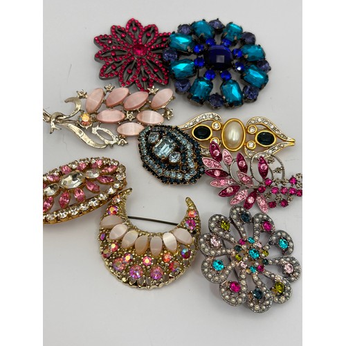 400 - A Collection Of Colourful Vintage Brooches.