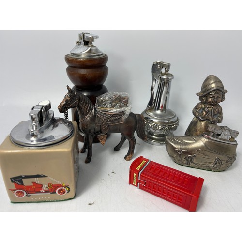 298 - 6 Table Lighters. Horse, Phone Box ETC