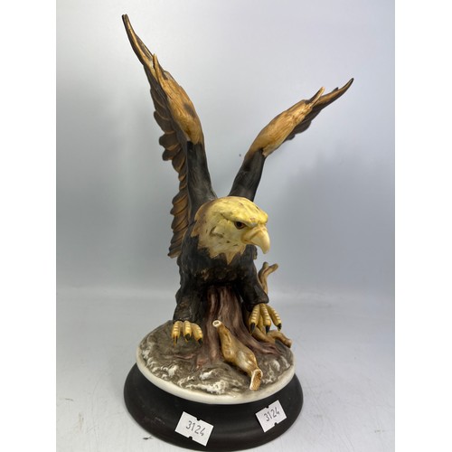 16 - Ceramic Hand Painted Eagle Figure Signed To Base Standing 11