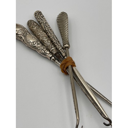 Collection Of Four Antique Silver Handled Button Hooks.