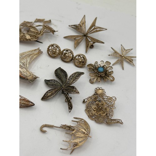 197 - Collection Of Silver? Filigree Brooches.