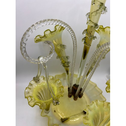 219 - Stunning Victorian  Manganese Yellow/Green Glass Epergne  With Hanging Basket Detail And Three Trump... 