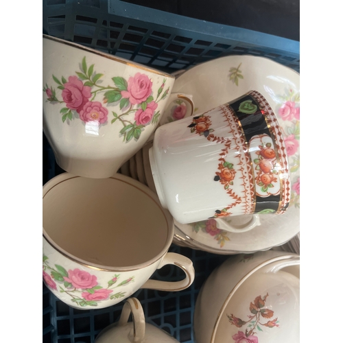 22 - Two Pretty China Tea Sets, Pink Set 23 Piece, Black Set 18 Pieces