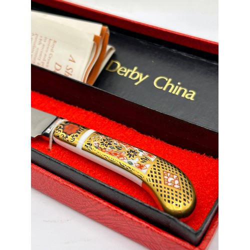 214 - Royal Crown Derby Boxed Cheese Knife.