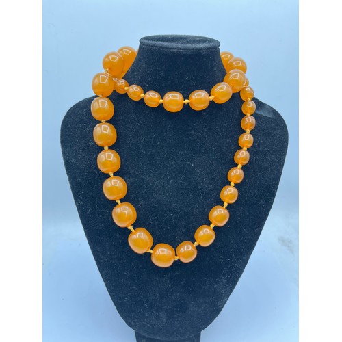 240 - Vintage Graduated Individually Knotted Amber Necklace 28