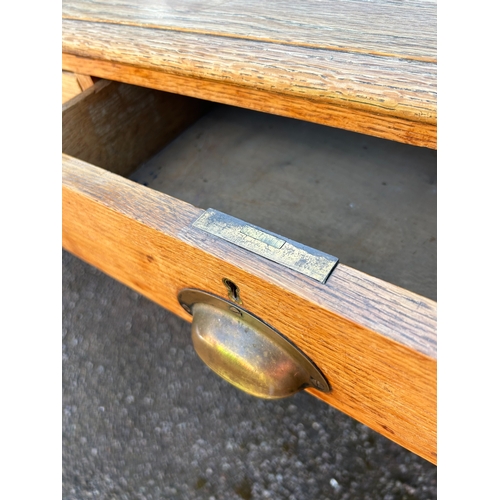 24 - A Late 19th/Early 20th Century Rustic Oak Table with Three Drawers