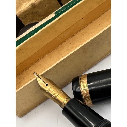 A Parker Slimfold Black Resin Fountain Pen with 14K Gold Nib