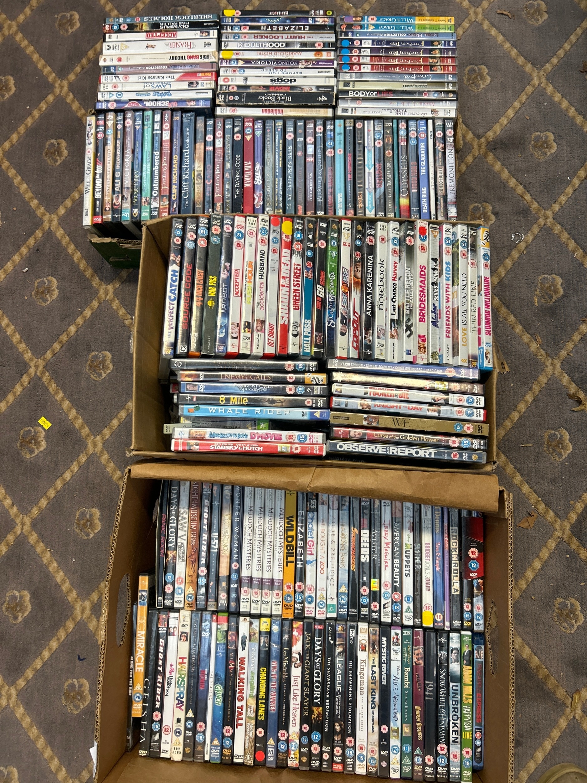 A Large Collection of Commercially Produced DVDs, comprising Movies and ...