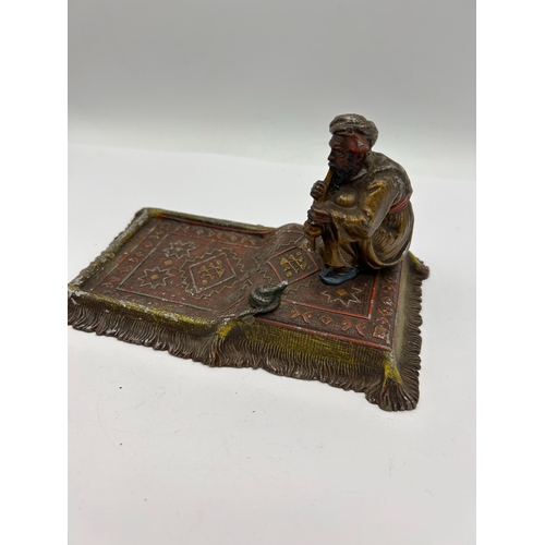 104 - Vienna Cold-Painted Orientalist Figurine of a Snake Charmer on a Rug