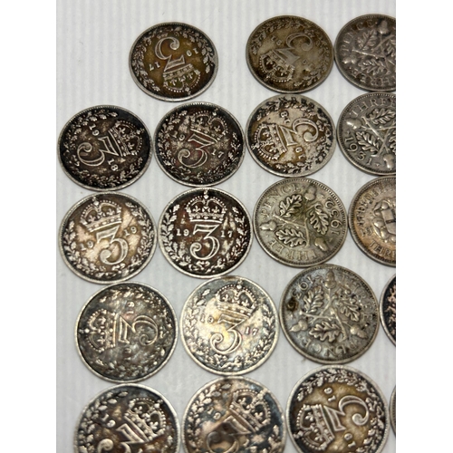 117 - A Collection of 23 British Silver Threepence Coins, George V and George VI Era