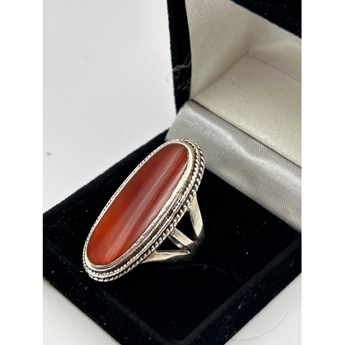 61 - Silver Ring Featuring Large Carnelian or Red Agate Cabochon