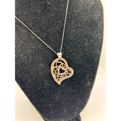 66 - A Modern Sterling Silver Openwork Heart Pendant Necklace