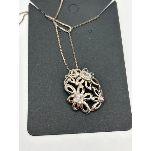 68 - Silver Openwork Floral Pendant Necklace Set with Simulant Stones