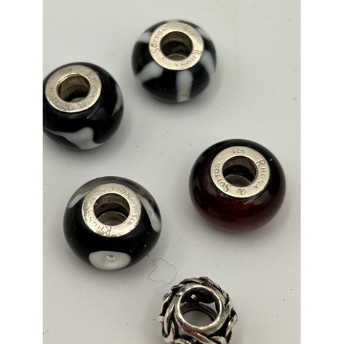 74 - A Collection of Five Sterling Silver Rhona Sutton Charm Beads