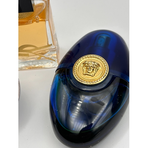78 - A Trio of Designer Fragrance Bottles including Versace Dylan Blue