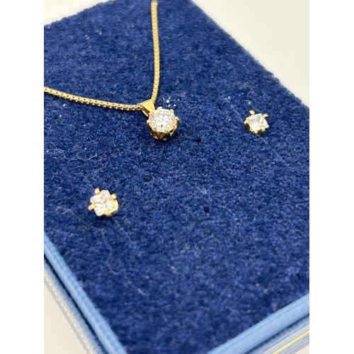 84 - Three-Piece Gold Jewelry Ensemble with Solitaire Pendant and Stud Earrings, 2.7g