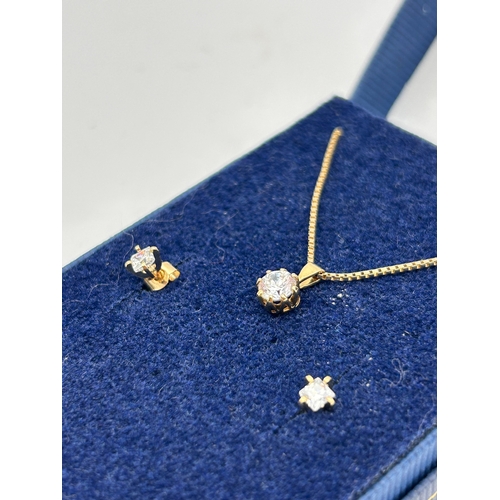 84 - Three-Piece Gold Jewelry Ensemble with Solitaire Pendant and Stud Earrings, 2.7g