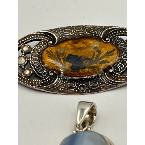 85 - A Silver Pendant Along With Butterfly Wing Brooch.