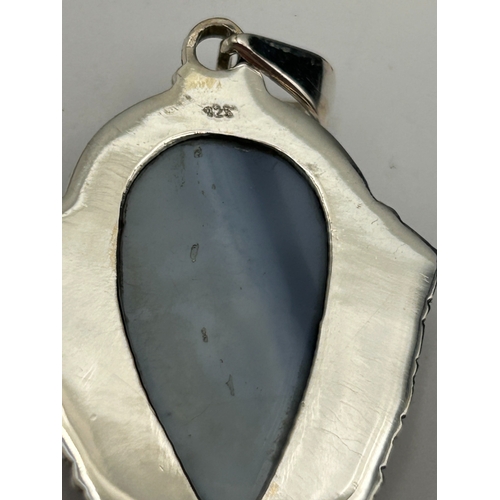 85 - A Silver Pendant Along With Butterfly Wing Brooch.