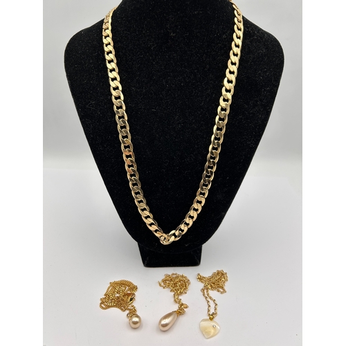 86 - A Collection of 4 Gold-Toned Necklaces including Heavy Curb Link Chain