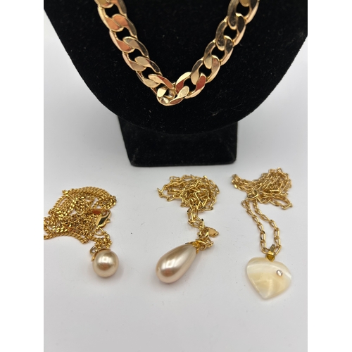 86 - A Collection of 4 Gold-Toned Necklaces including Heavy Curb Link Chain