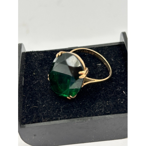 92 - A 9ct Gold Cocktail Ring Set with a Large Oval Created Emerald Stone