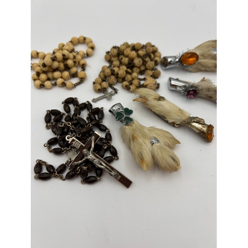 98 - A Collection of Eight Vintage Religious Items and Animal Foot Brooches.