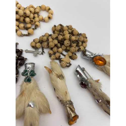 98 - A Collection of Eight Vintage Religious Items and Animal Foot Brooches.