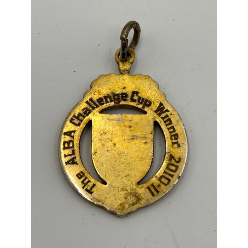 112 - A Collection of Eight Vintage English and Scottish Football League Medallions and Fobs